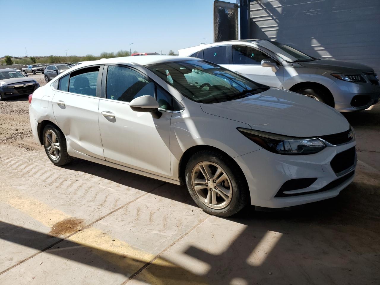 2018 Chevrolet Cruze VIN 1G1BE5SM5J7156284 Copart auction photo, rear end / side damage thumbnail 4