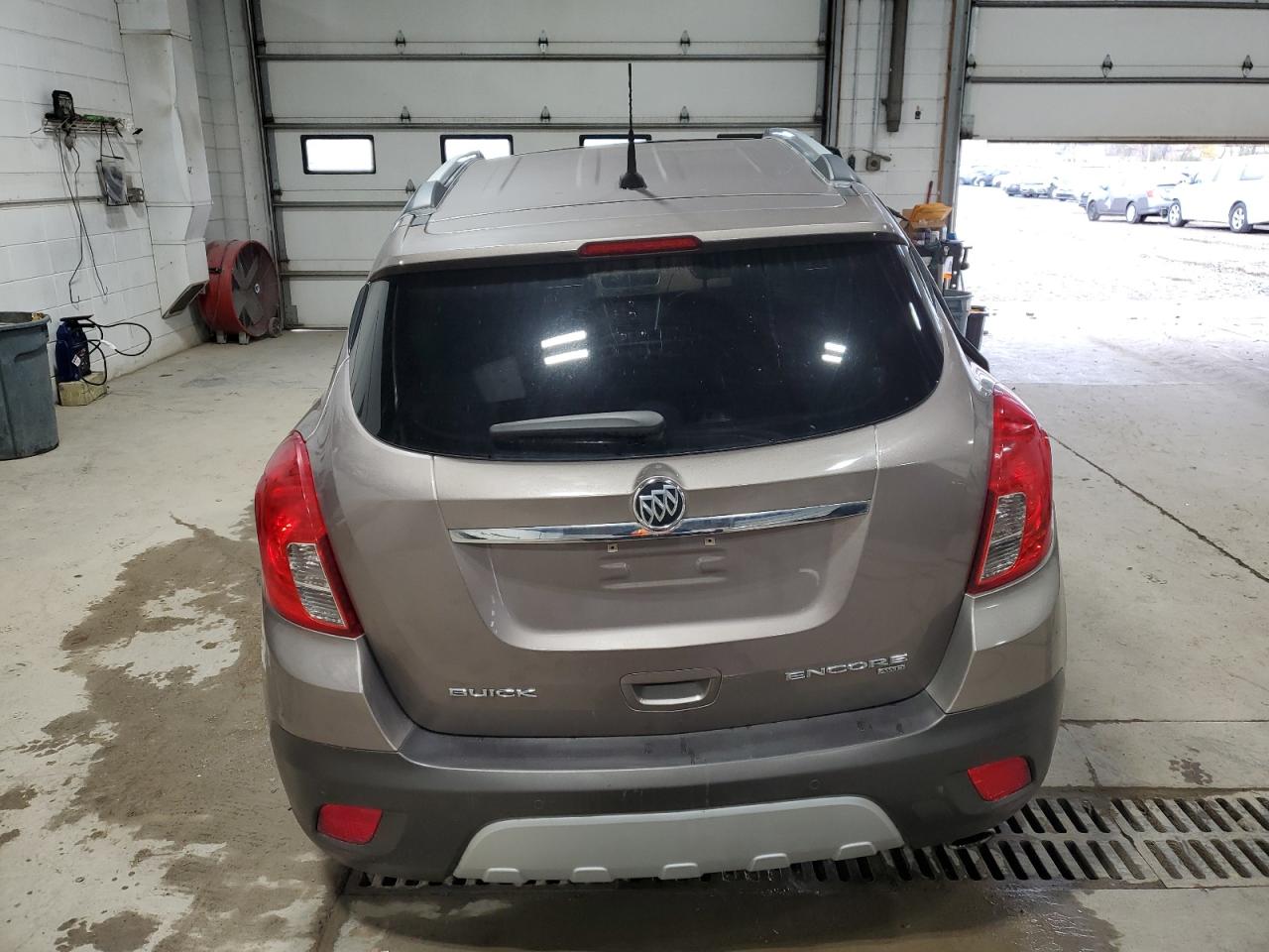 2014 Buick Encore VIN KL4CJHSB5EB661570 Copart auction photo, side / rear end damage thumbnail 6
