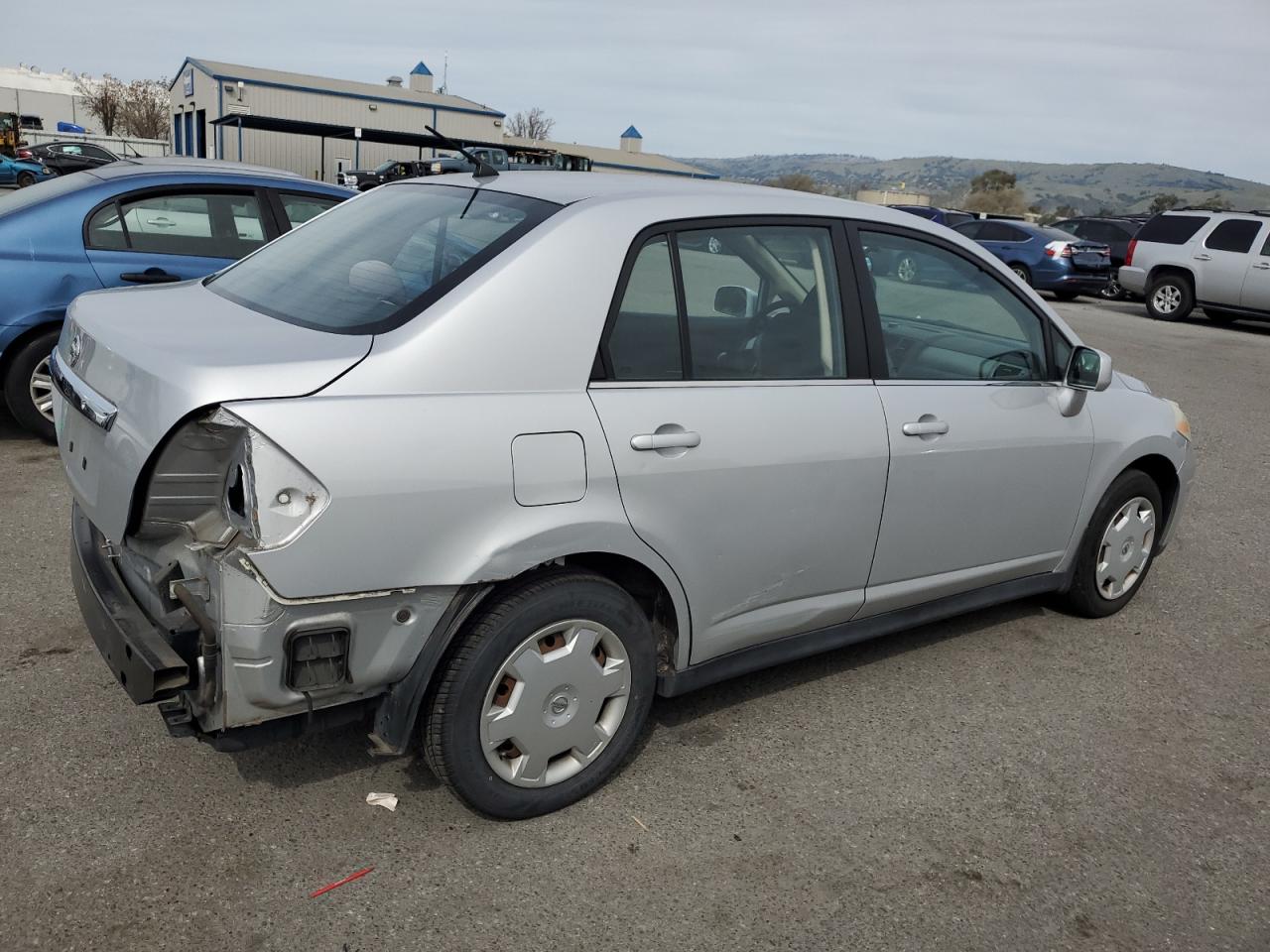2009 Nissan Versa VIN 3N1BC11E69L374261 Copart auction photo, rear end damage thumbnail 3
