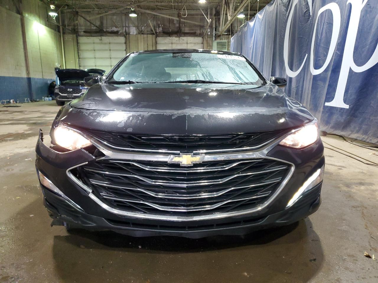 2023 Chevrolet Malibu VIN 1G1ZD5ST4PF136065 Copart auction photo, rear end / side damage thumbnail 5