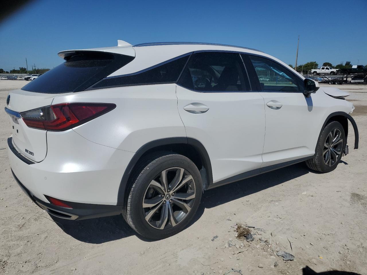 2022 Lexus RX VIN 2T2HZMAA3NC237128 Copart auction photo, front end / minor dent/scratches damage thumbnail 3