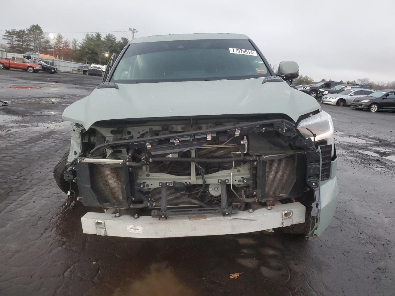2023 Toyota Tundra VIN 5TFJC5EC1PX002952 Copart auction photo, front end / side damage thumbnail 5