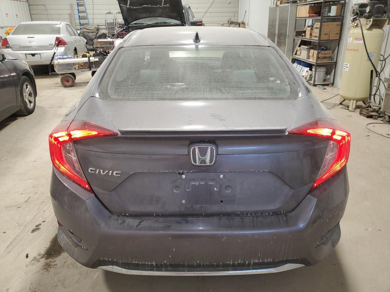 2020 Honda Civic VIN 19XFC1F35LE018921 Copart auction photo, side / front end damage thumbnail 6