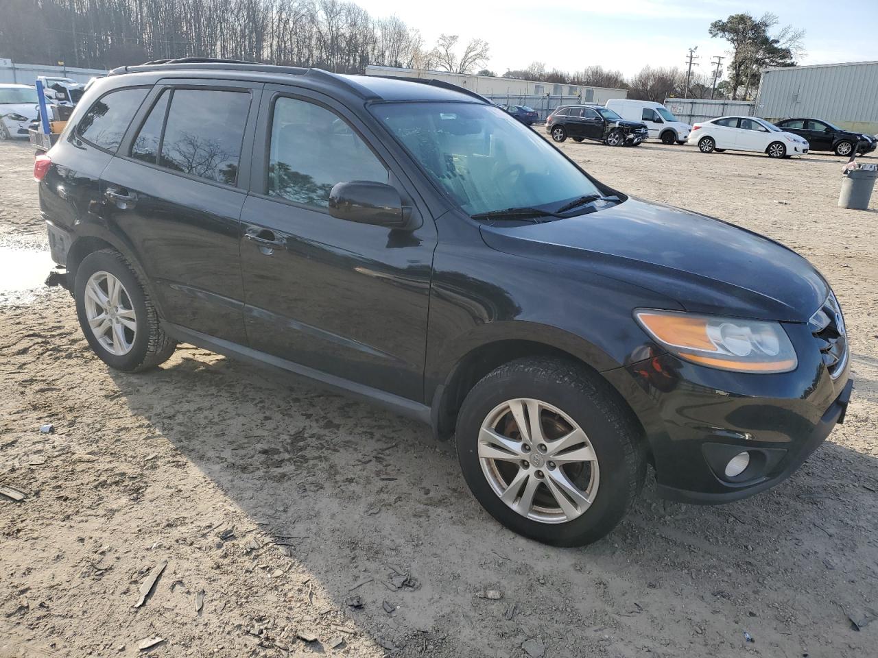 2011 Hyundai Santa Fe VIN 5XYZH4AG2BG056666 Copart auction photo, rear end / minor dent/scratches damage thumbnail 4