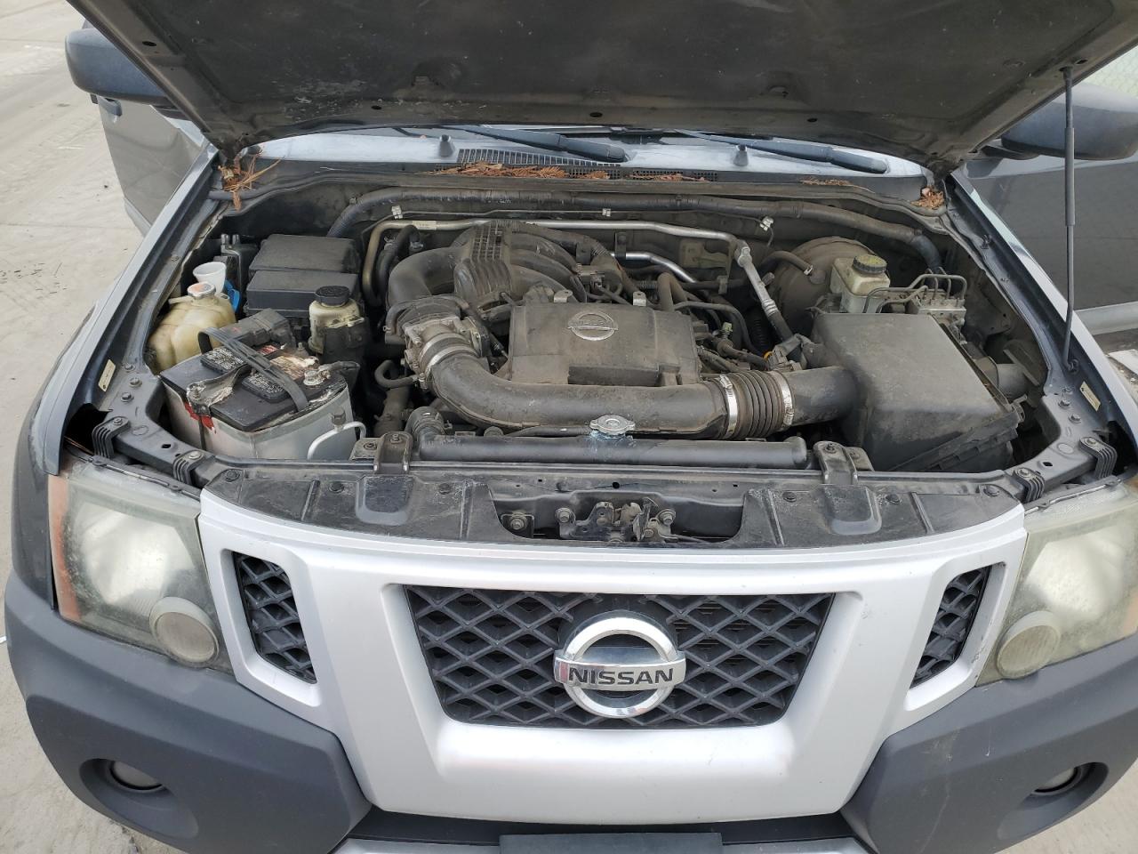 2013 Nissan XTerra VIN 5N1AN0NW3DN815011 Copart auction photo, front end / side damage thumbnail 12