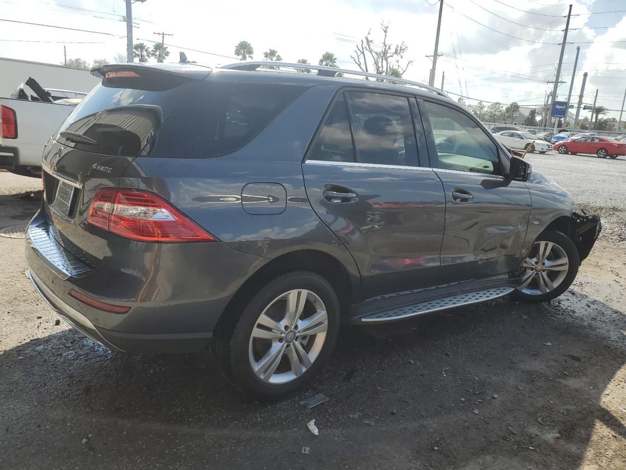 2012 Mercedes-Benz M-klasse VIN 4JGDA5HBXCA066874 Copart auction photo, side damage thumbnail 3