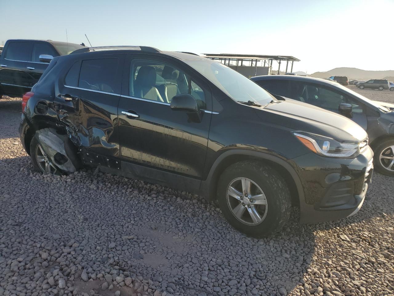 2018 Chevrolet Trax VIN 3GNCJPSBXJL243733 Copart auction photo, side / rear end damage thumbnail 4