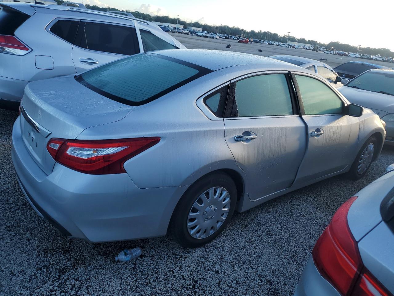 2016 Nissan Altima VIN 1N4AL3AP6GC189910 Copart auction photo, water/flood damage thumbnail 3