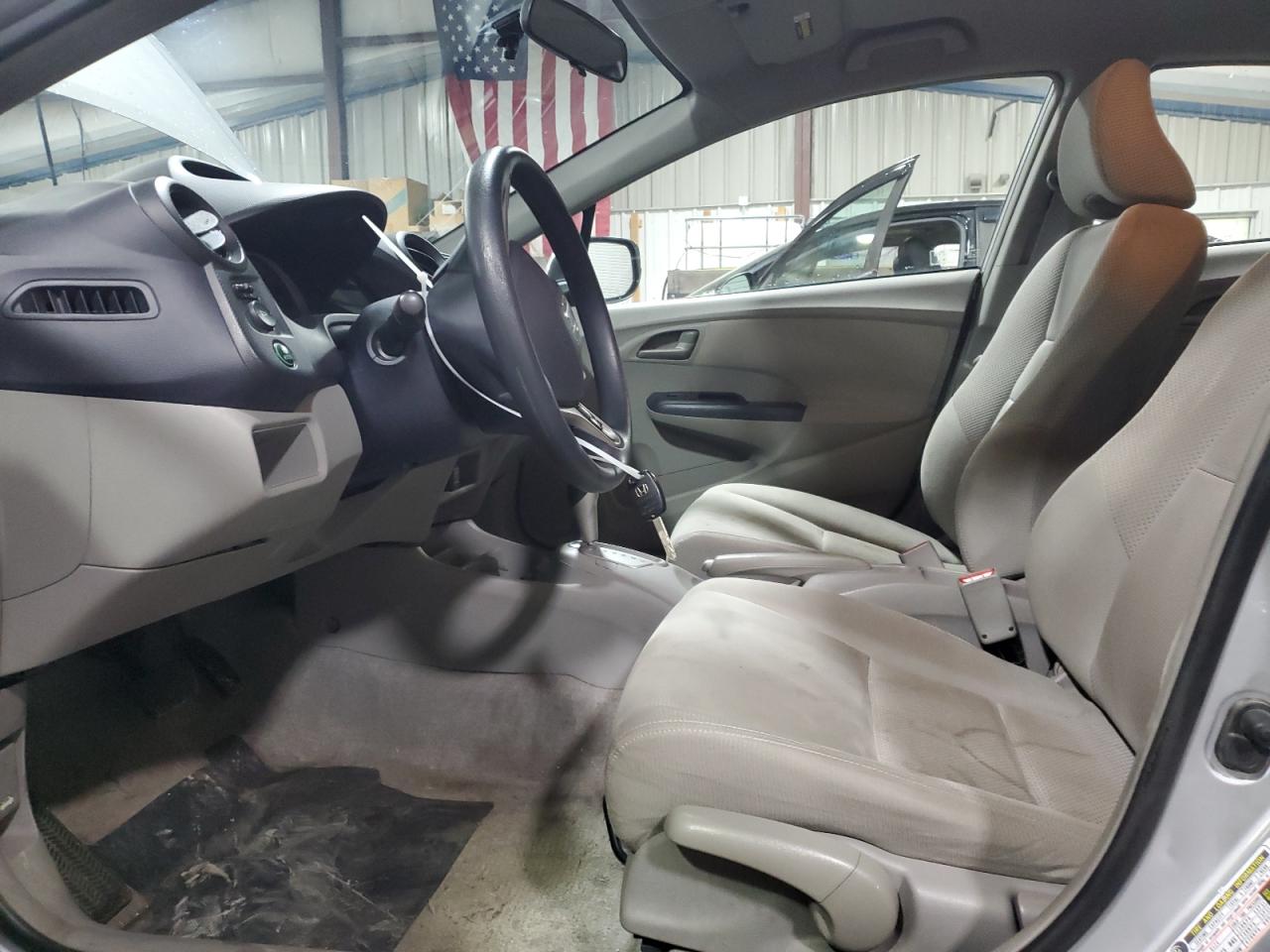 2010 Honda Insight VIN JHMZE2H5XAS040031 Copart auction photo, side / front end damage thumbnail 7