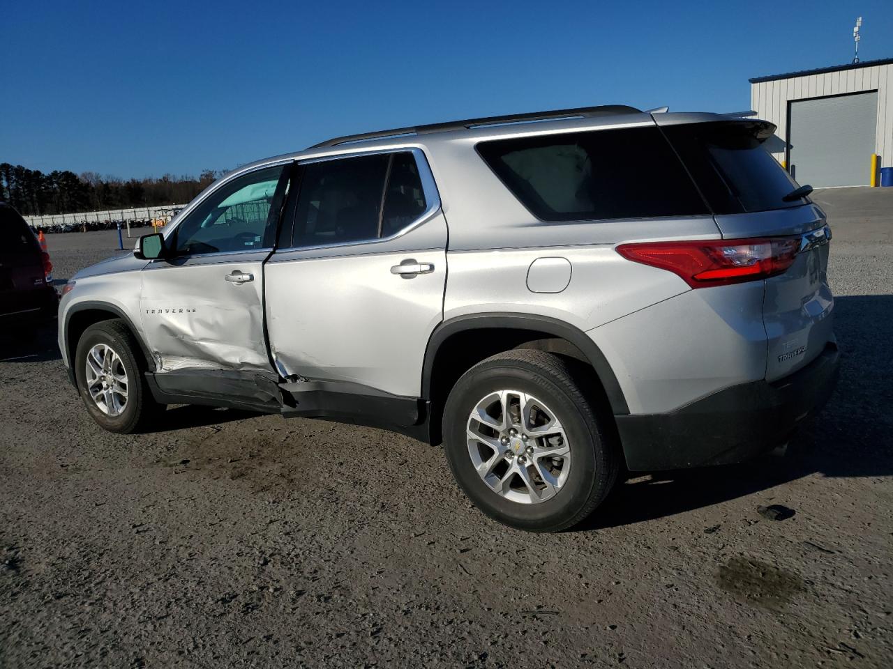 2020 Chevrolet Traverse VIN 1GNERGKWXLJ263799 Copart auction photo, side damage thumbnail 2