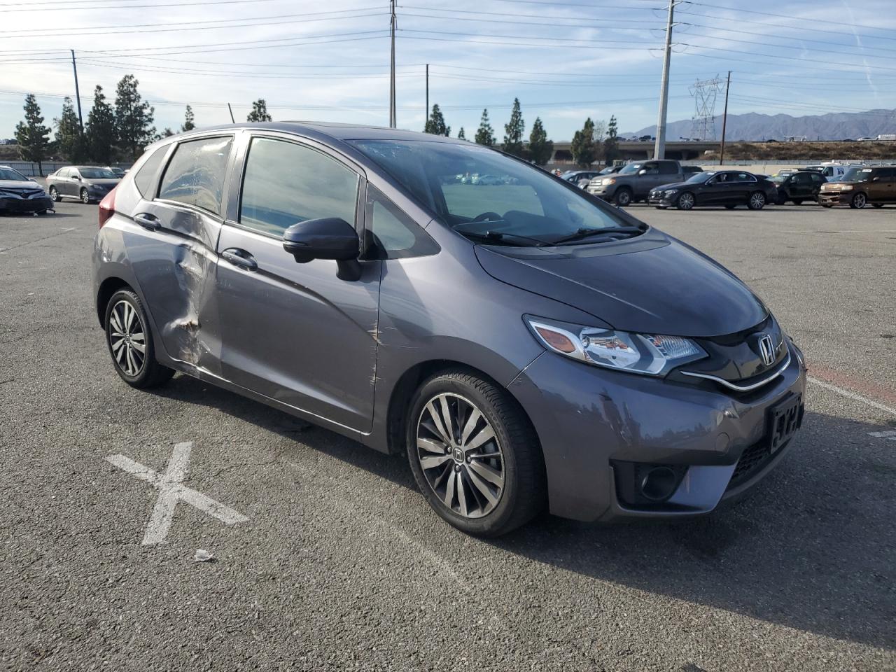 2015 Honda Fit VIN 3HGGK5H84FM713619 Copart auction photo, side / front end damage thumbnail 4