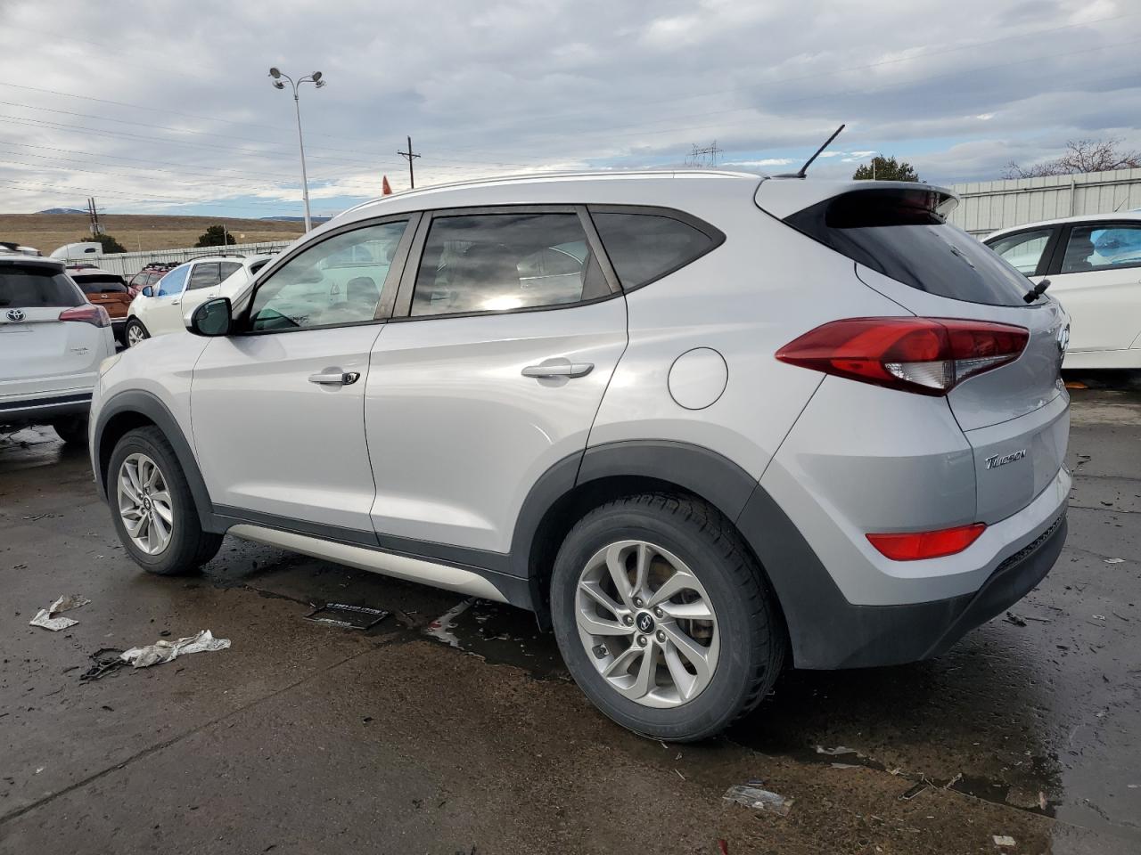 2017 Hyundai Tucson VIN KM8J3CA42HU280065 Copart auction photo, vandalism / hail damage thumbnail 2