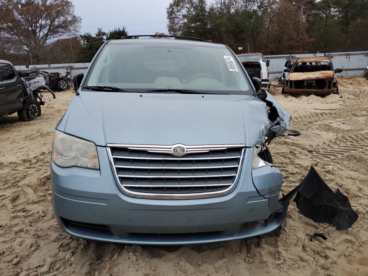 2010 Chrysler Town & Country VIN 2A4RR4DEXAR161919 Copart auction photo, front end / minor dent/scratches damage thumbnail 5