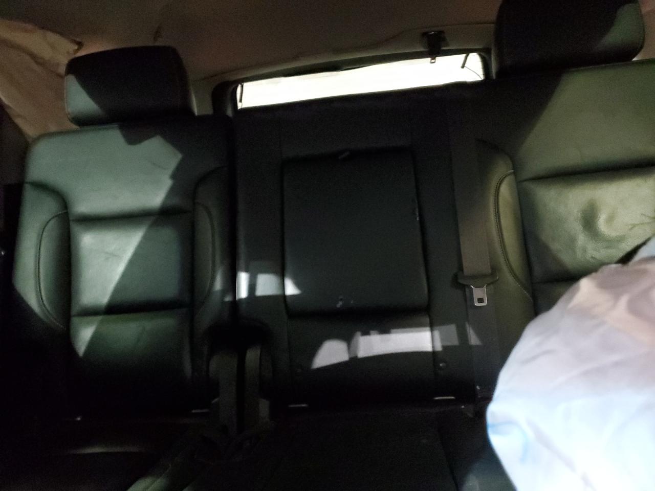 2015 Chevrolet Tahoe VIN 1GNSKBKC9FR585792 Copart auction photo, all over damage thumbnail 10