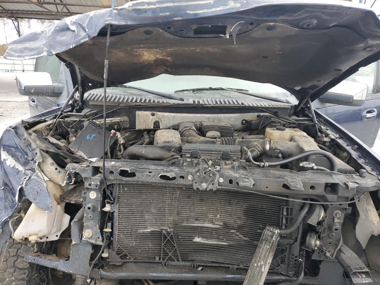 2010 Ford Expedition VIN 1FMJU1J55AEB59105 Copart auction photo, front end / minor dent/scratches damage thumbnail 13