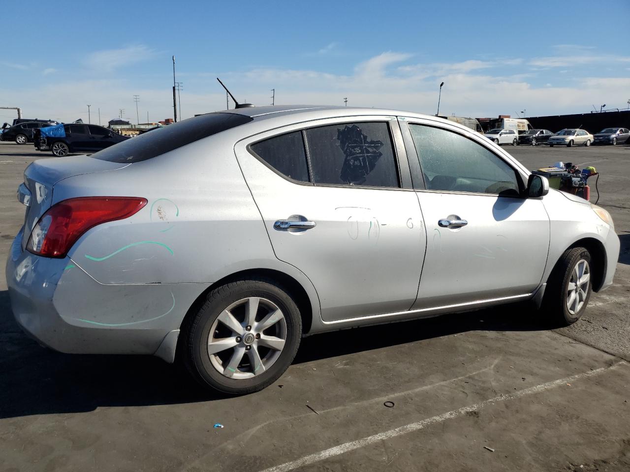 2012 Nissan Versa VIN 3N1CN7AP2CL891857 Copart auction photo, minor dent/scratches damage thumbnail 3