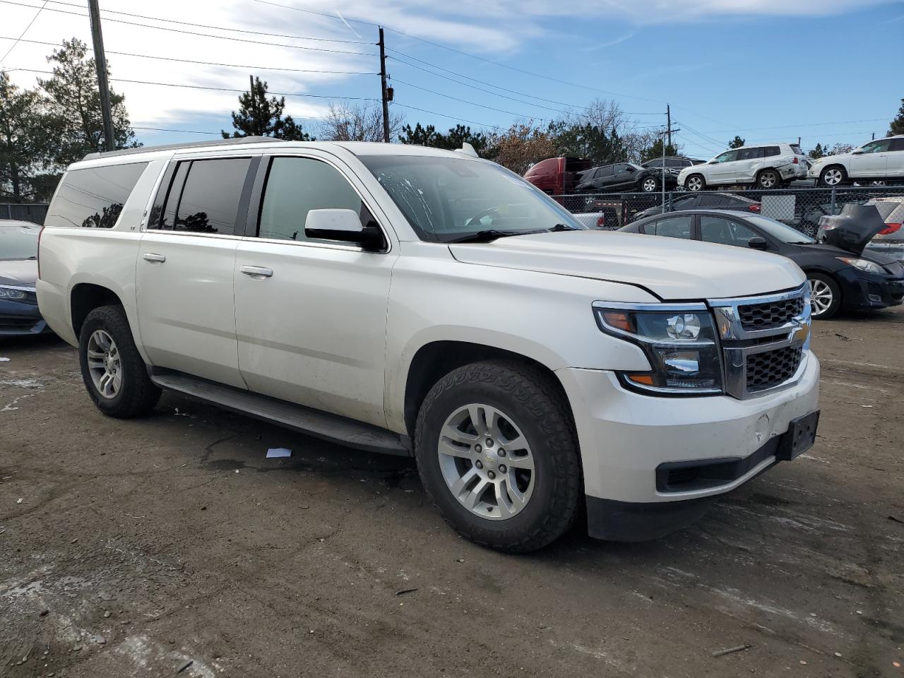 2015 Chevrolet Suburban VIN 1GNSCJKC0FR602504 Copart auction photo, front end / hail damage thumbnail 4