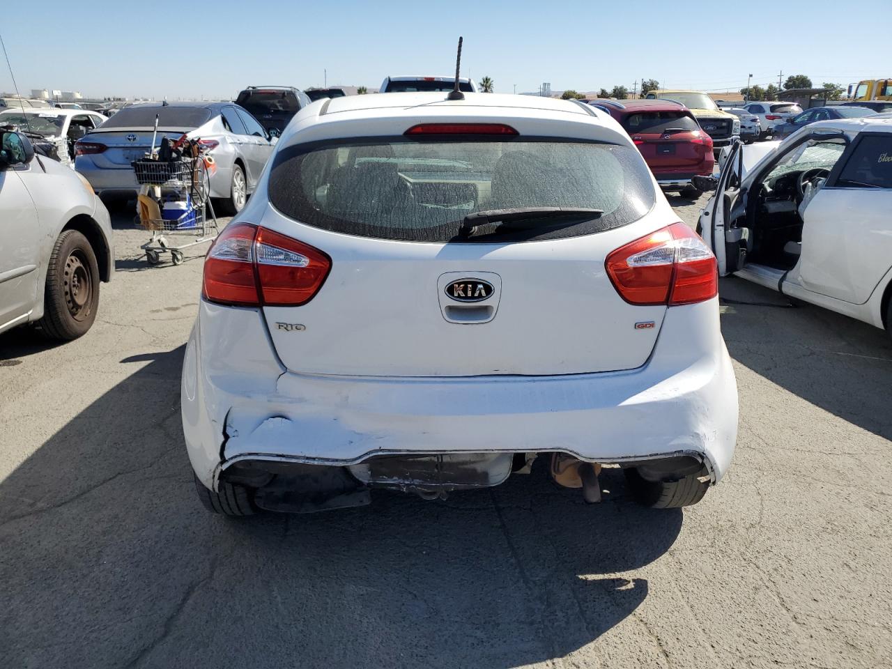2013 KIA Rio VIN KNADM5A32D6110043 Copart auction photo, rear end damage thumbnail 6