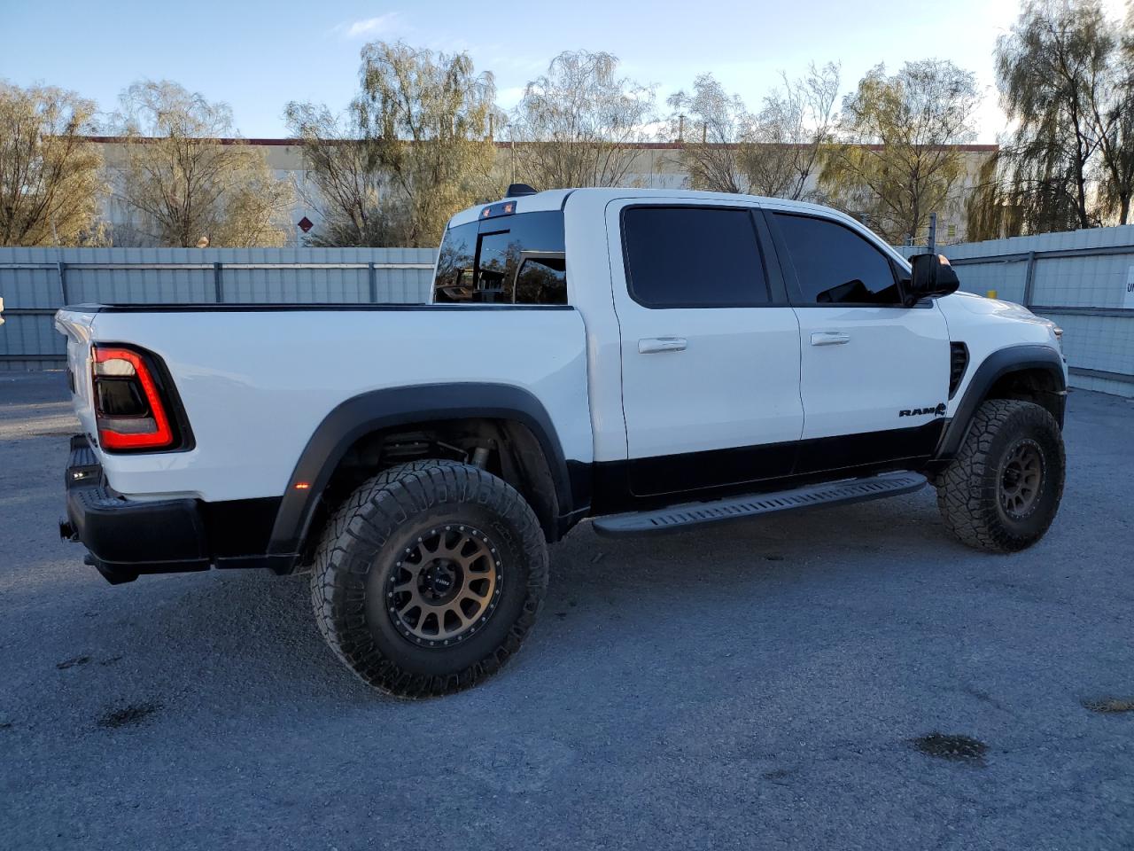2022 RAM 1500 VIN 1C6SRFU91NN318396 Copart auction photo, vandalism damage thumbnail 3