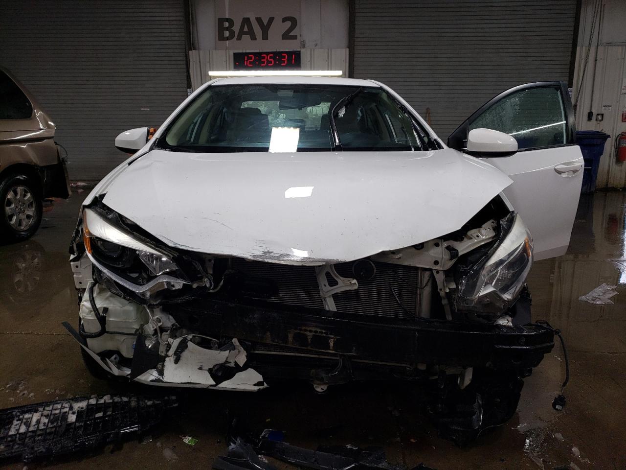 2015 Toyota Corolla VIN 2T1BURHE5FC240094 Copart auction photo, front end damage thumbnail 5