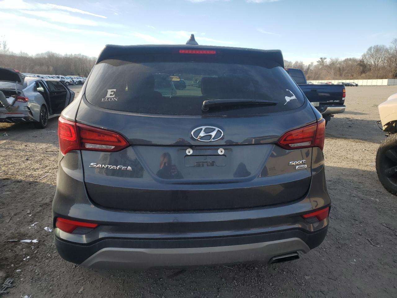 2017 Hyundai Santa Fe VIN 5XYZTDLB3HG466255 Copart auction photo, front end / minor dent/scratches damage thumbnail 6