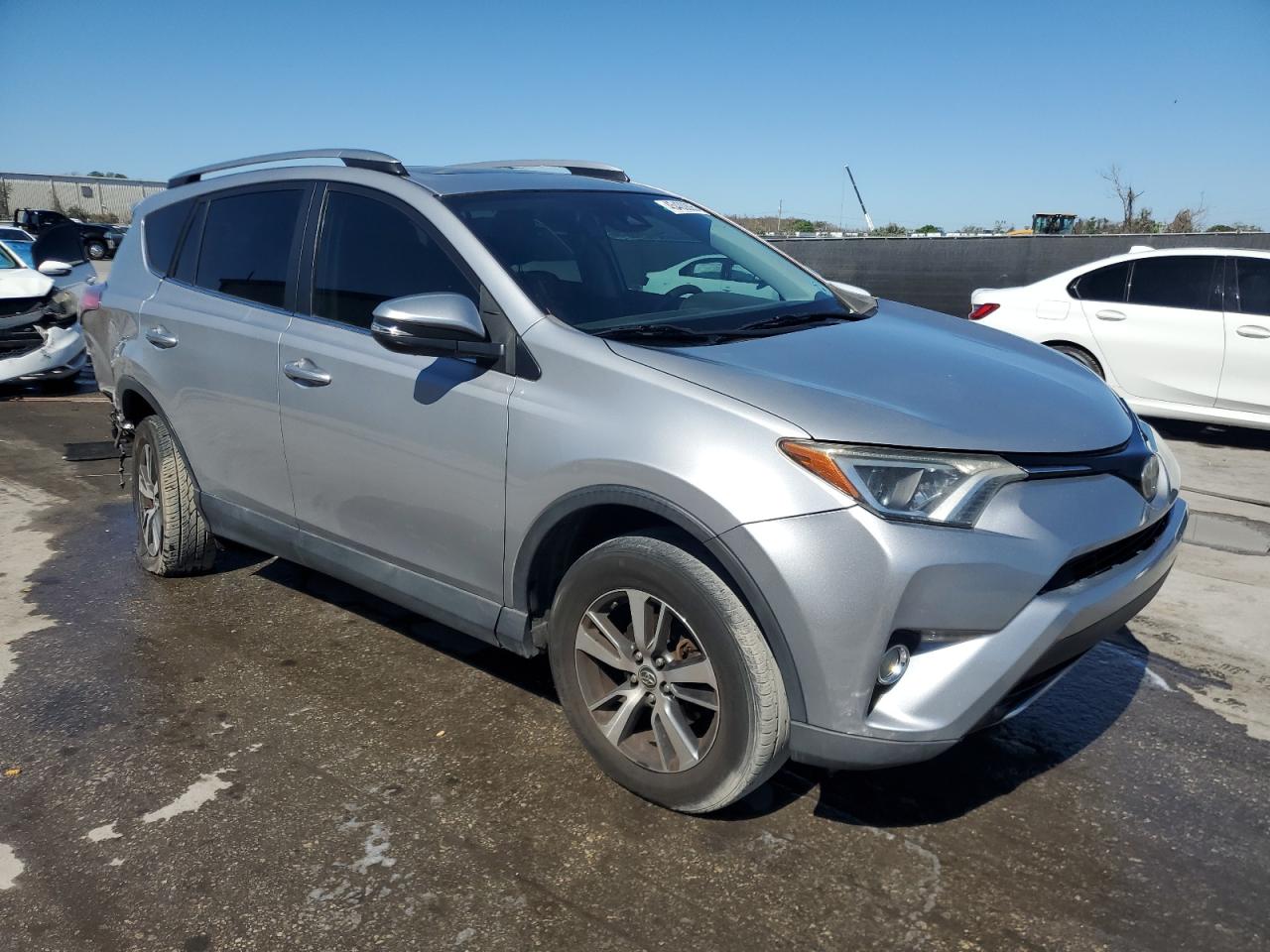 2017 Toyota RAV 4 VIN 2T3WFREV2HW391306 Copart auction photo, rear end / side damage thumbnail 4