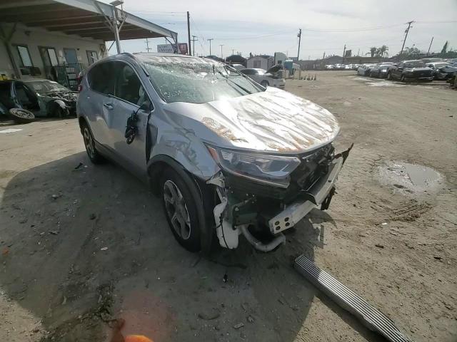 2017 Honda CR-V VIN 7FARW1H82HE035842 Copart auction photo, rollover damage thumbnail 11