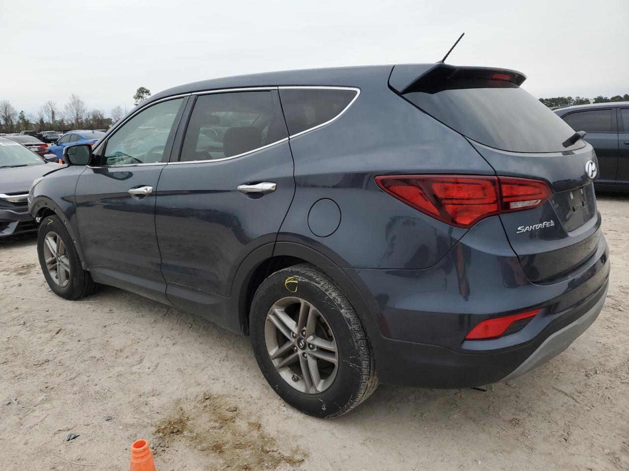 2018 Hyundai Santa Fe VIN 5NMZT3LB9JH088609 Copart auction photo, front end / side damage thumbnail 2