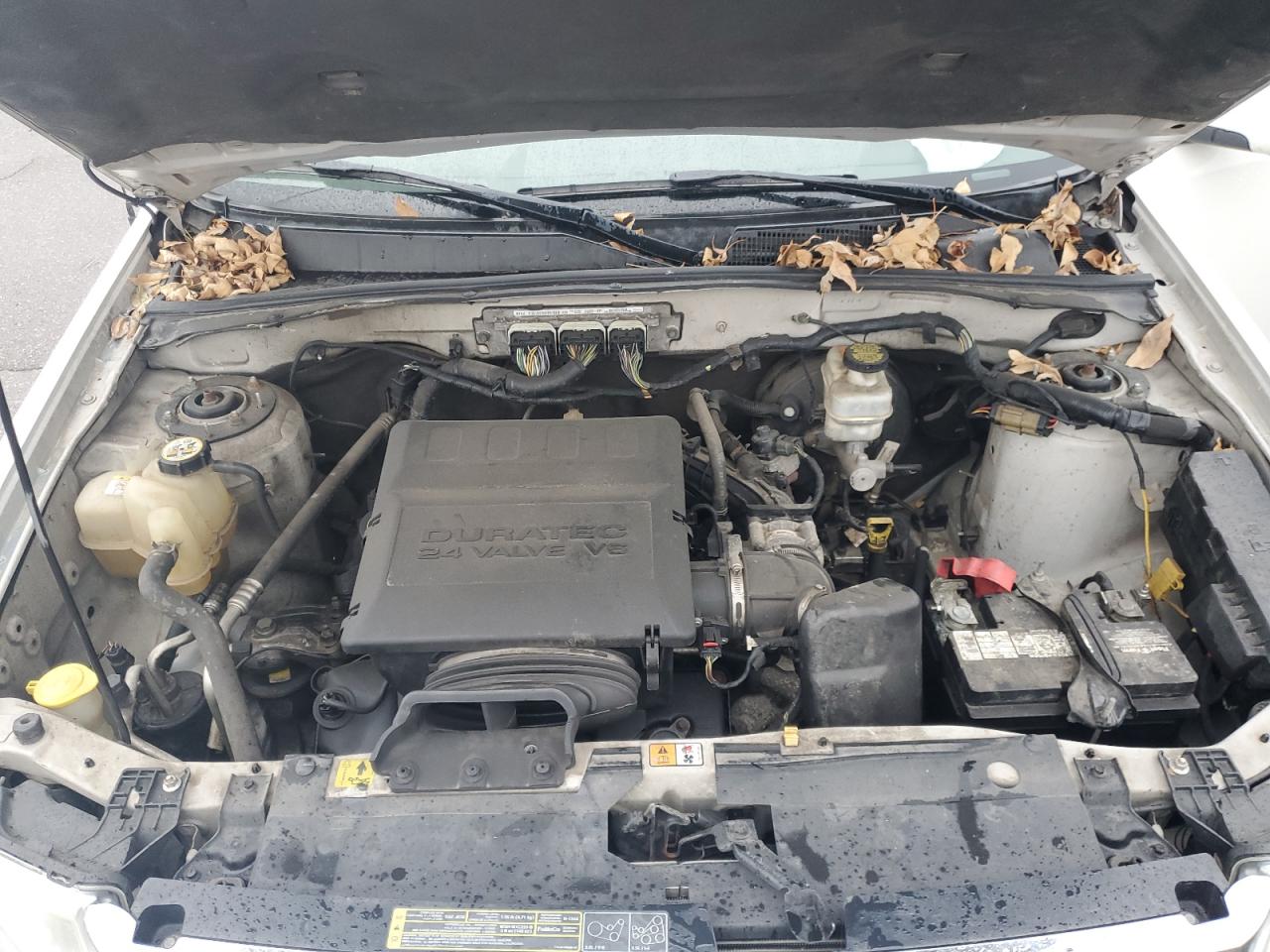 2010 Ford Escape VIN 1FMCU9EG8AKC95913 Copart auction photo, stripped damage thumbnail 12