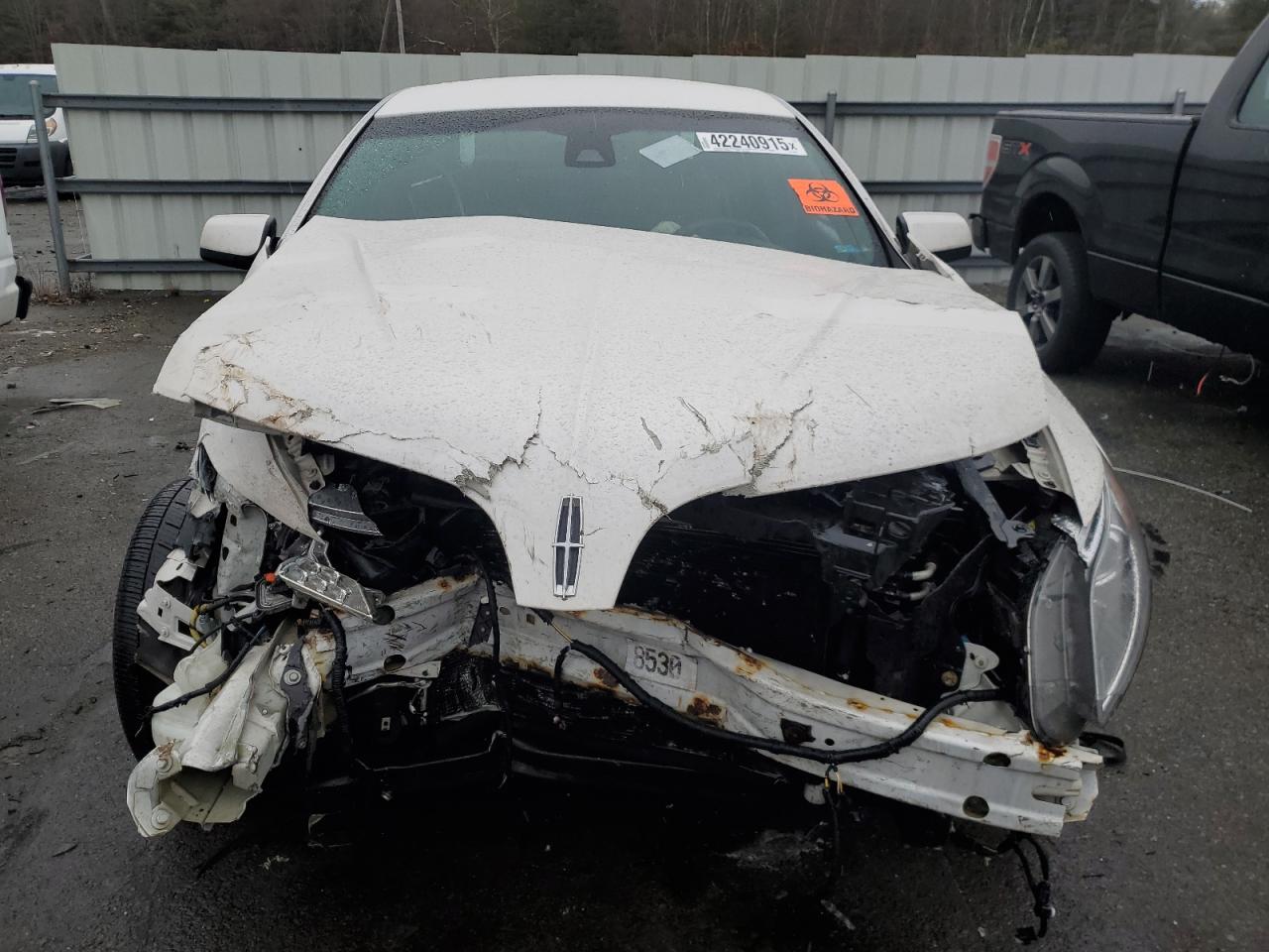 2016 Lincoln MKS VIN 1LNHL9DK5GG602738 Copart auction photo, front end / side damage thumbnail 5