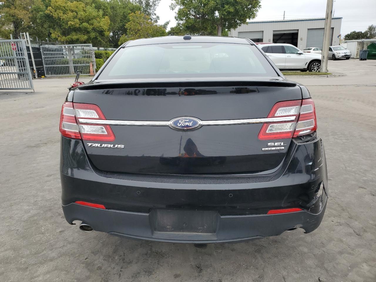2018 Ford Taurus VIN 1FAHP2E80JG111087 Copart auction photo, front end / rear end damage thumbnail 6