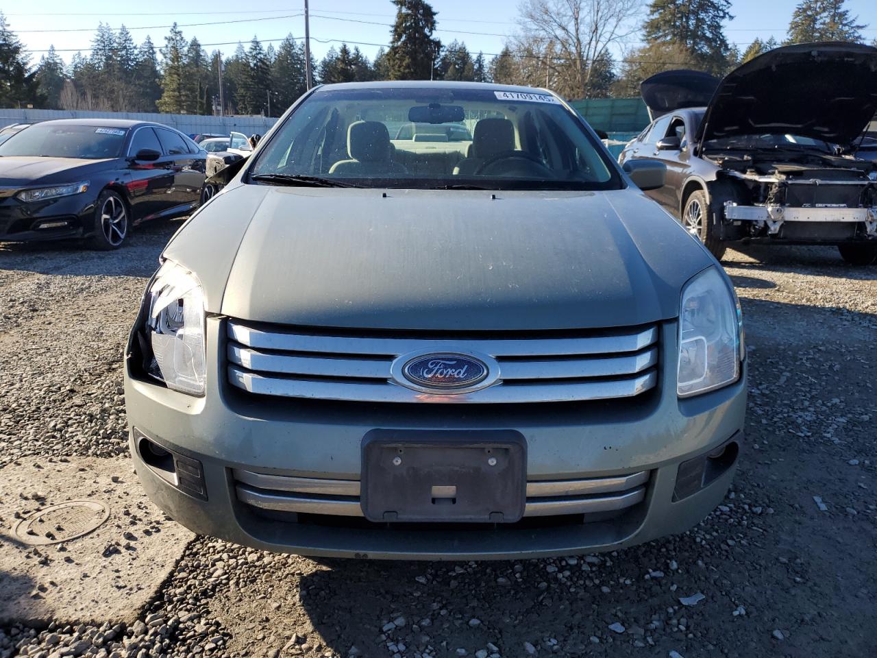 2009 Ford Fusion VIN 3FAHP07Z69R191722 Copart auction photo, front end / side damage thumbnail 5