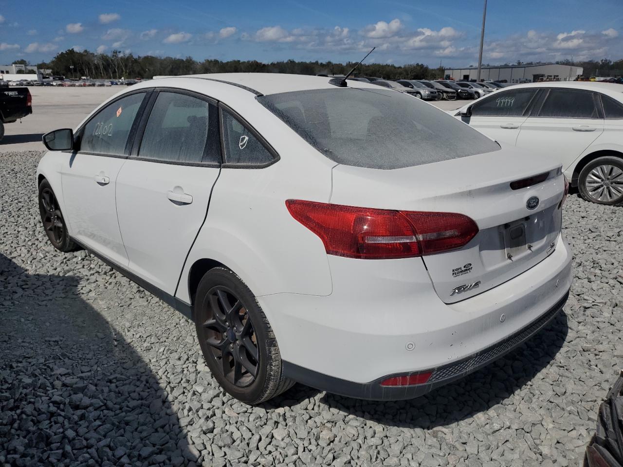 2016 Ford Focus VIN 1FADP3F21GL298998 Copart auction photo, normal wear damage thumbnail 2