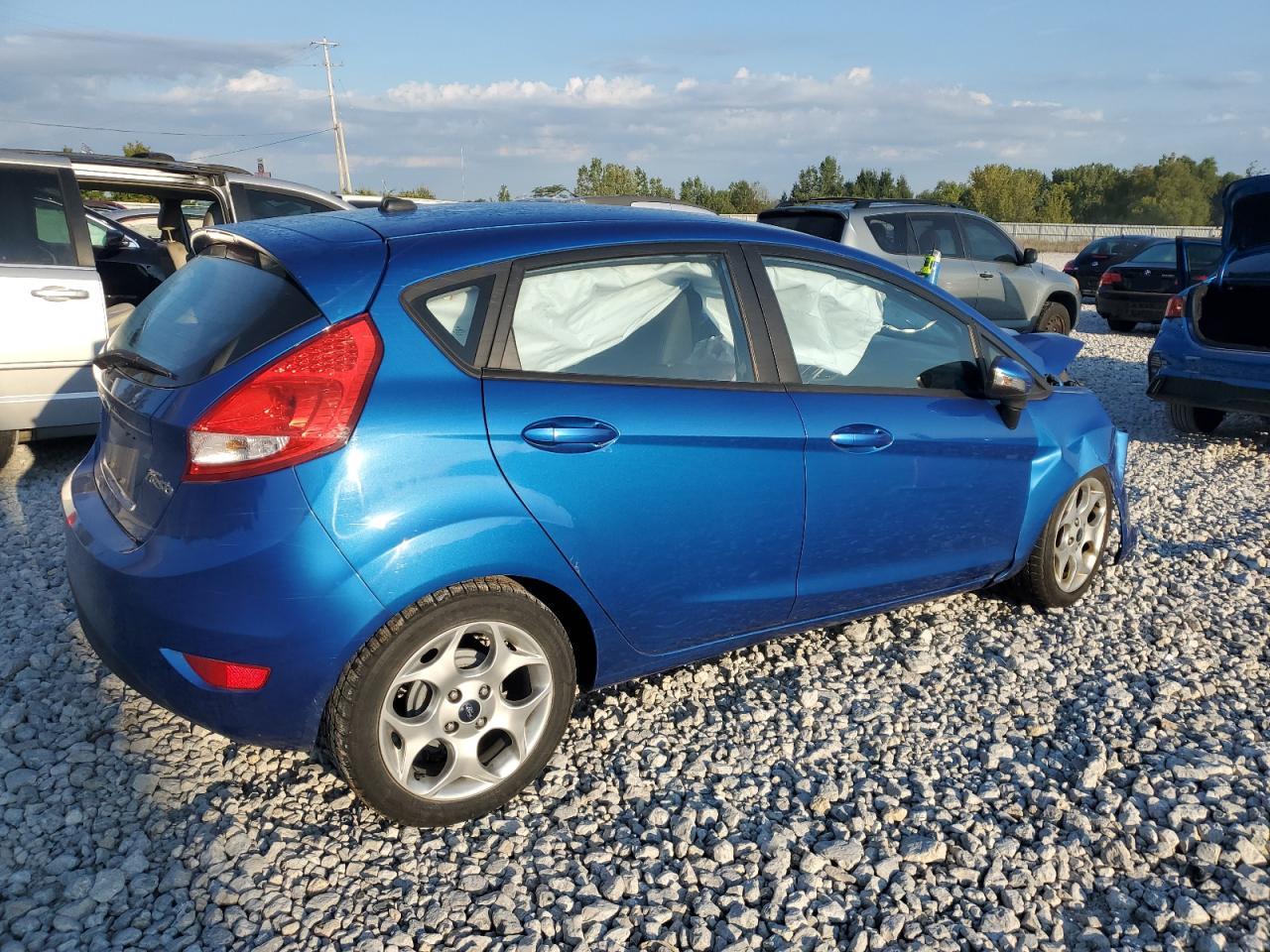 2011 Ford Fiesta VIN 3FADP4FJ8BM172724 Copart auction photo, front end / side damage thumbnail 3