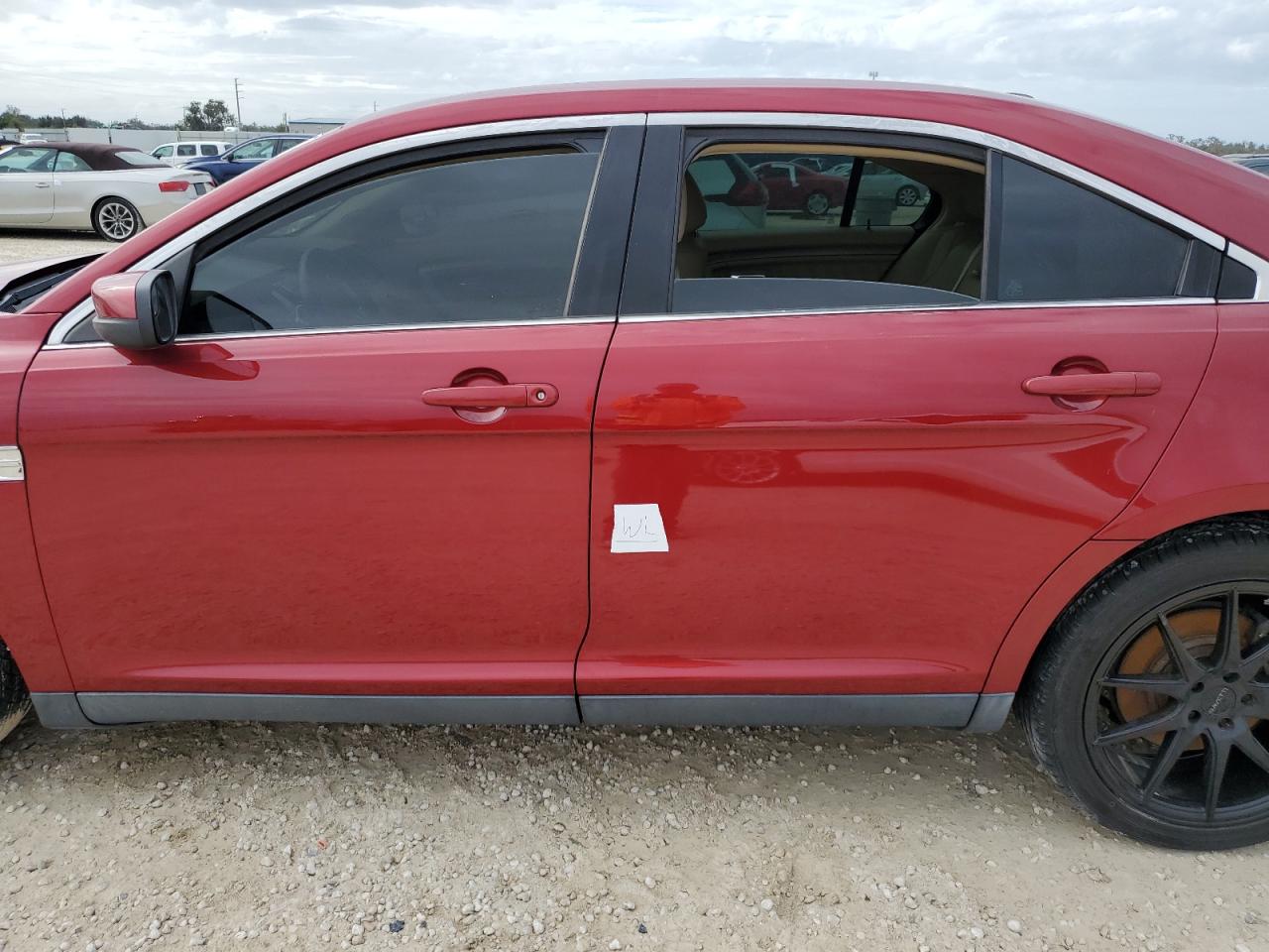 2013 Ford Taurus VIN 1FAHP2E81DG147584 Copart auction photo, water/flood damage thumbnail 12