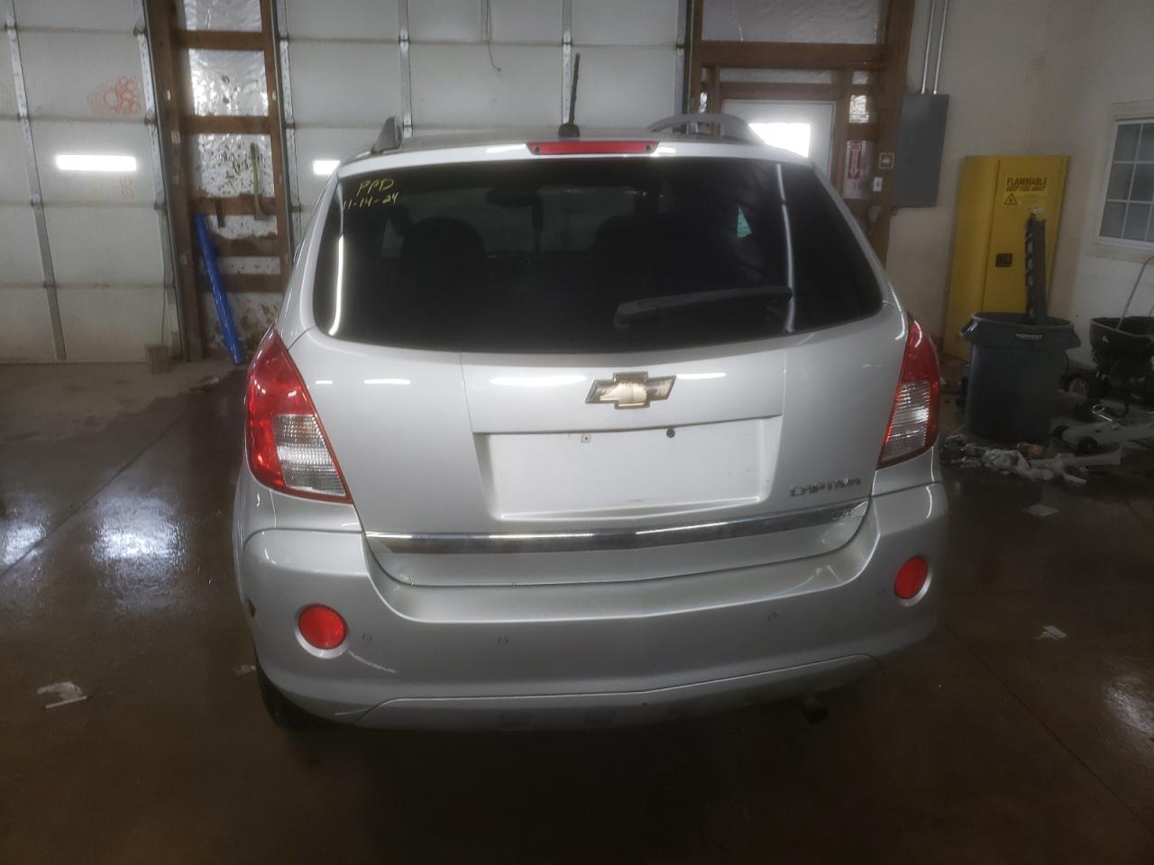 2014 Chevrolet Captiva VIN 3GNAL4EK4ES513420 Copart auction photo, side / front end damage thumbnail 6