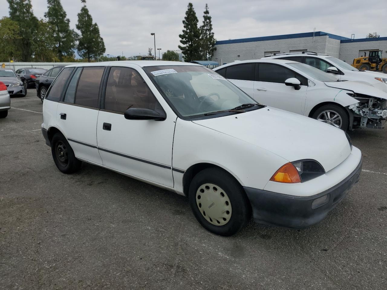 1993 GEO Metro VIN 2C1MR6469P6700123 Copart auction photo, minor dent/scratches damage thumbnail 4