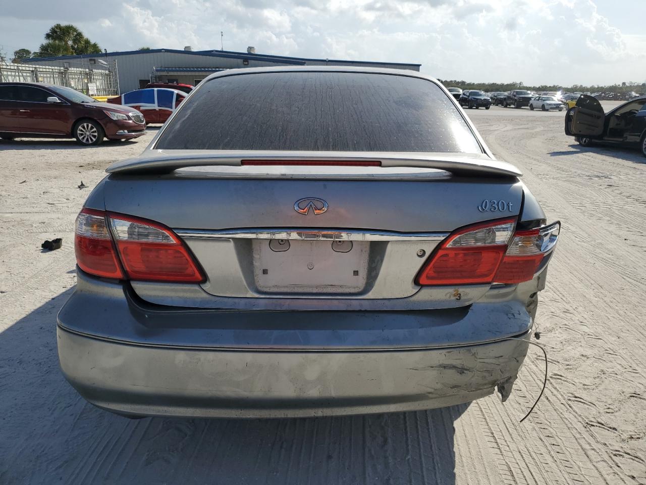 2000 Infiniti I VIN JNKCA31A0YT123308 Copart auction photo, rear end / minor dent/scratches damage thumbnail 6