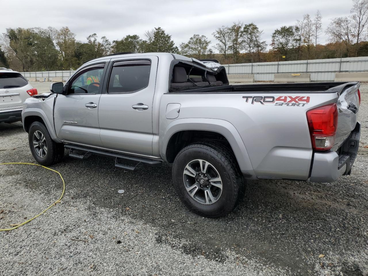 2017 Toyota Tacoma VIN 5TFCZ5AN0HX107918 Copart auction photo, top/roof damage thumbnail 2