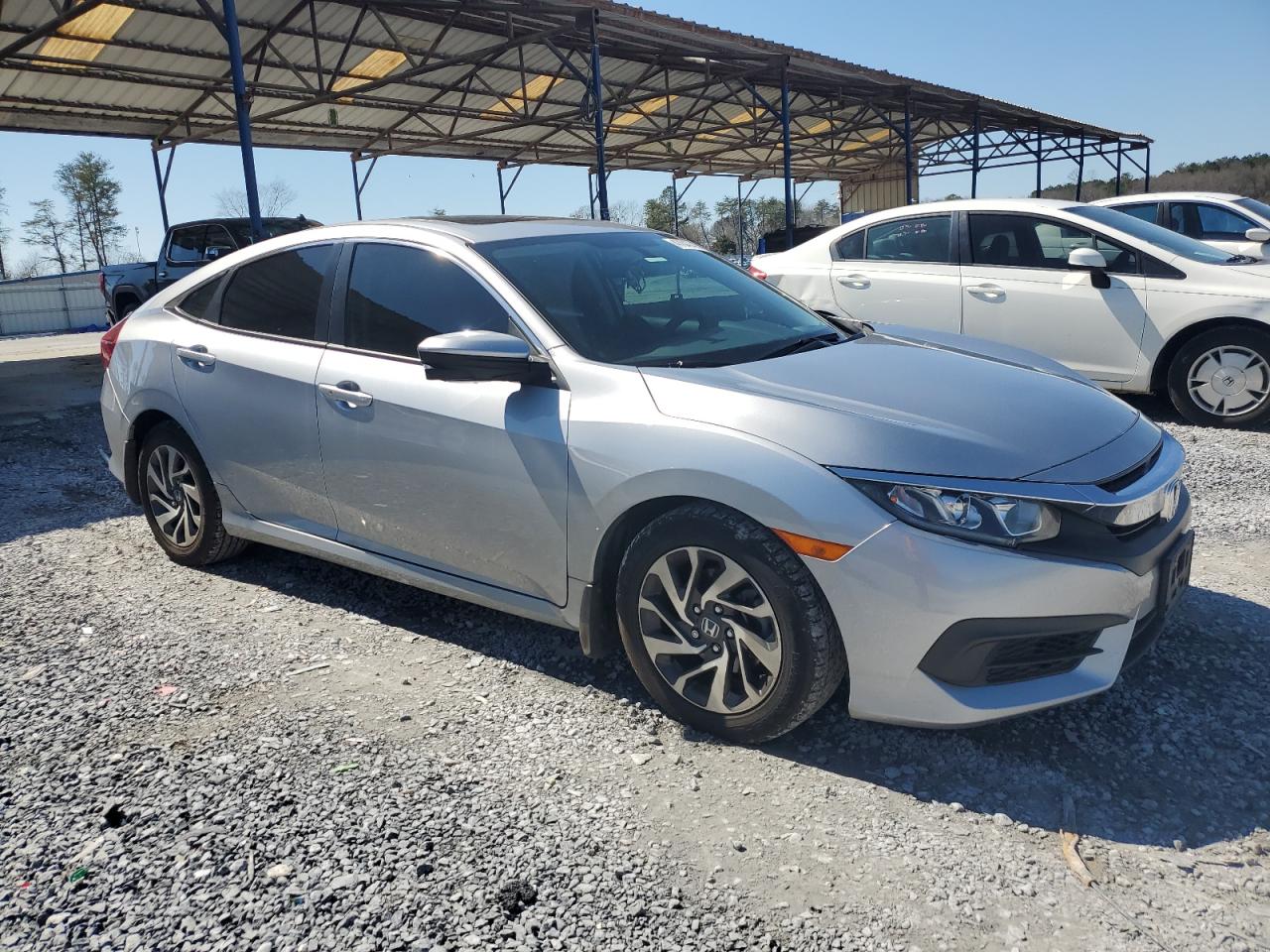 2017 Honda Civic VIN 2HGFC2F73HH565403 Copart auction photo, side / rear end damage thumbnail 4