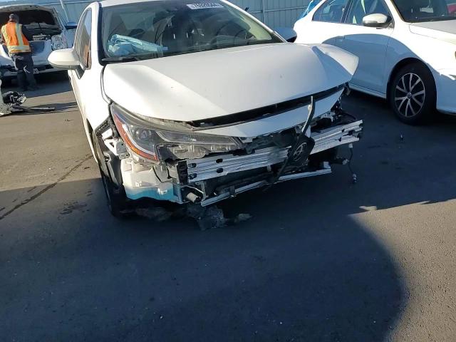 2021 Toyota Corolla VIN JTDVPMAE2MJ156737 Copart auction photo, front end damage thumbnail 11