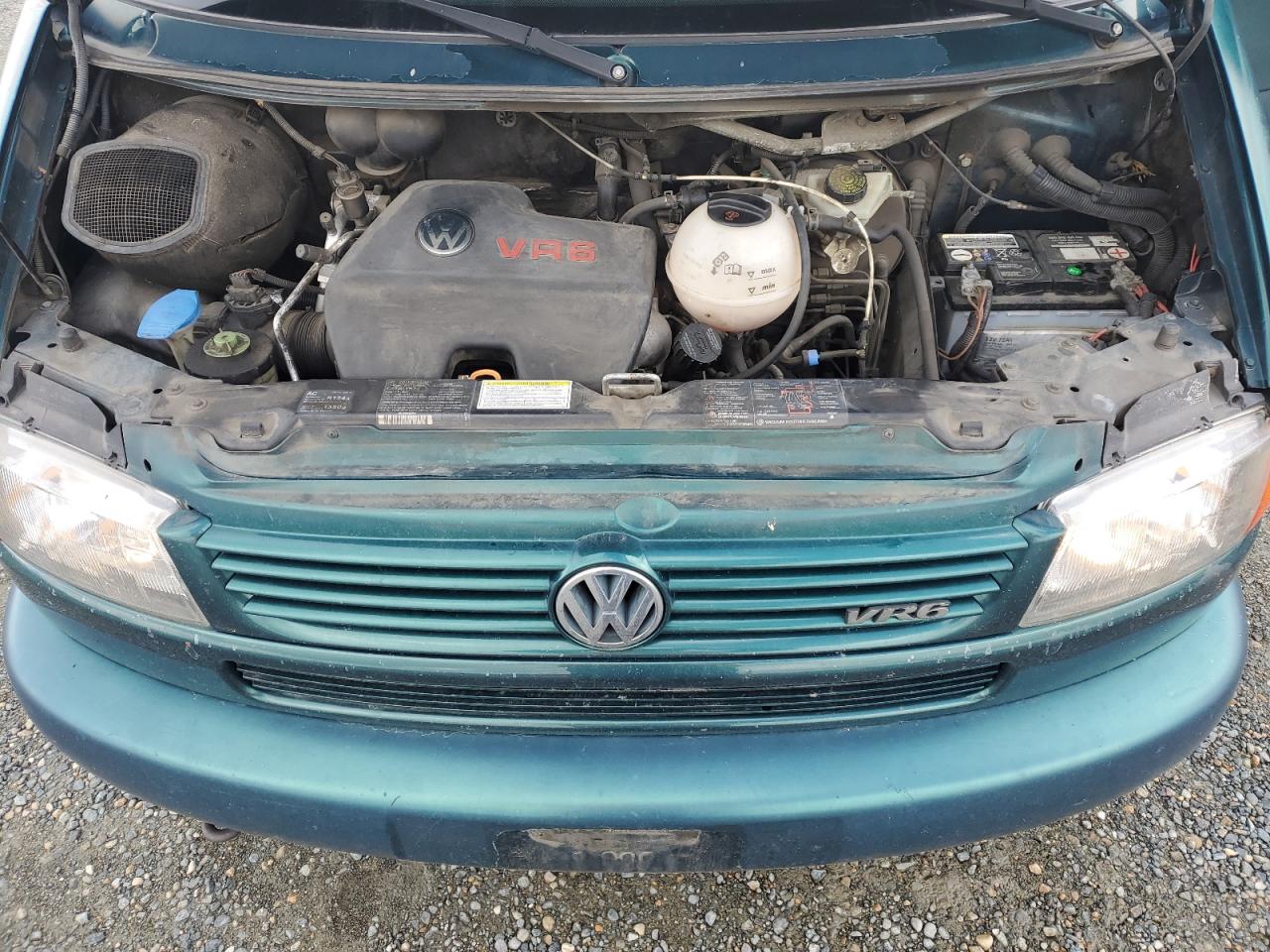 1999 Volkswagen EuroVan VIN WV2MH8708XH001005 Copart auction photo, minor dent/scratches damage thumbnail 12