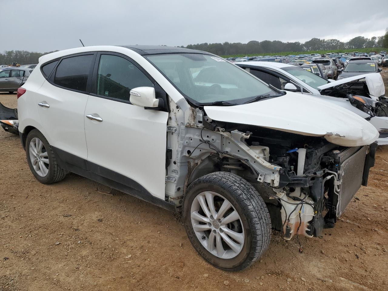 2012 Hyundai Tucson VIN KM8JU3AC7CU385794 Copart auction photo, front end / side damage thumbnail 4