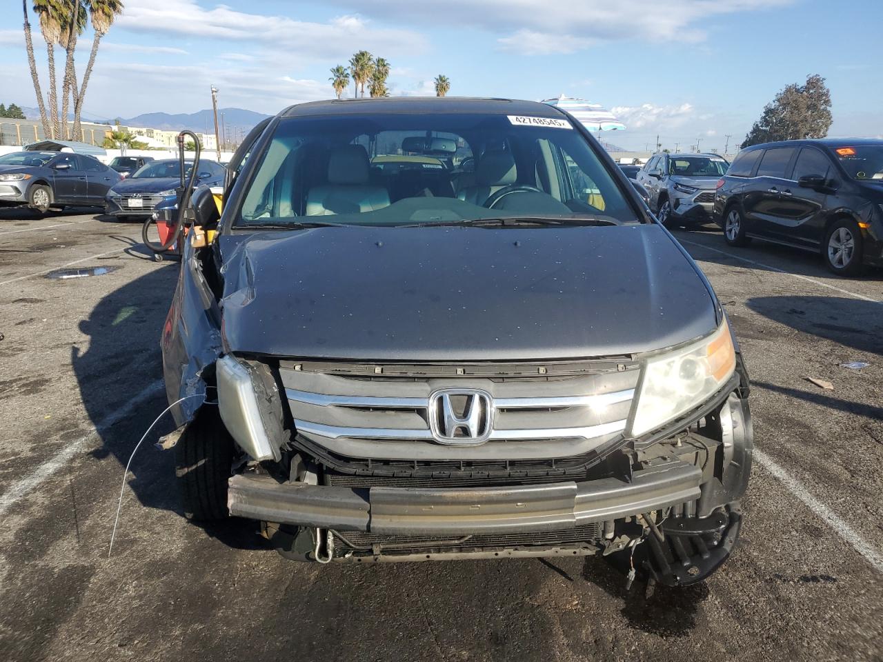 2012 Honda Odyssey VIN 5FNRL5H67CB073344 Copart auction photo, front end / side damage thumbnail 5