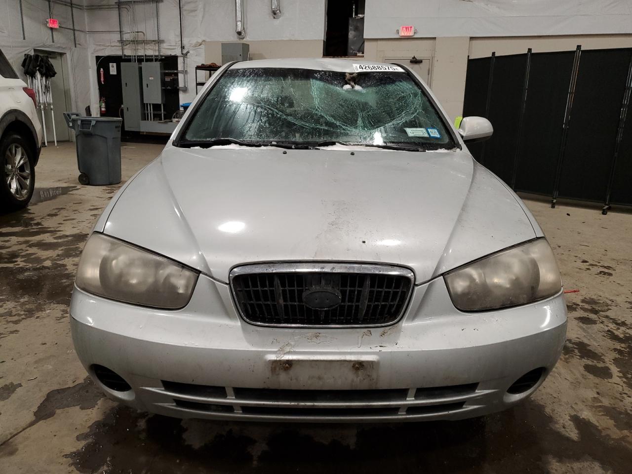 2003 Hyundai Elantra VIN KMHDN45D43U571330 Copart auction photo, front end / top/roof damage thumbnail 5