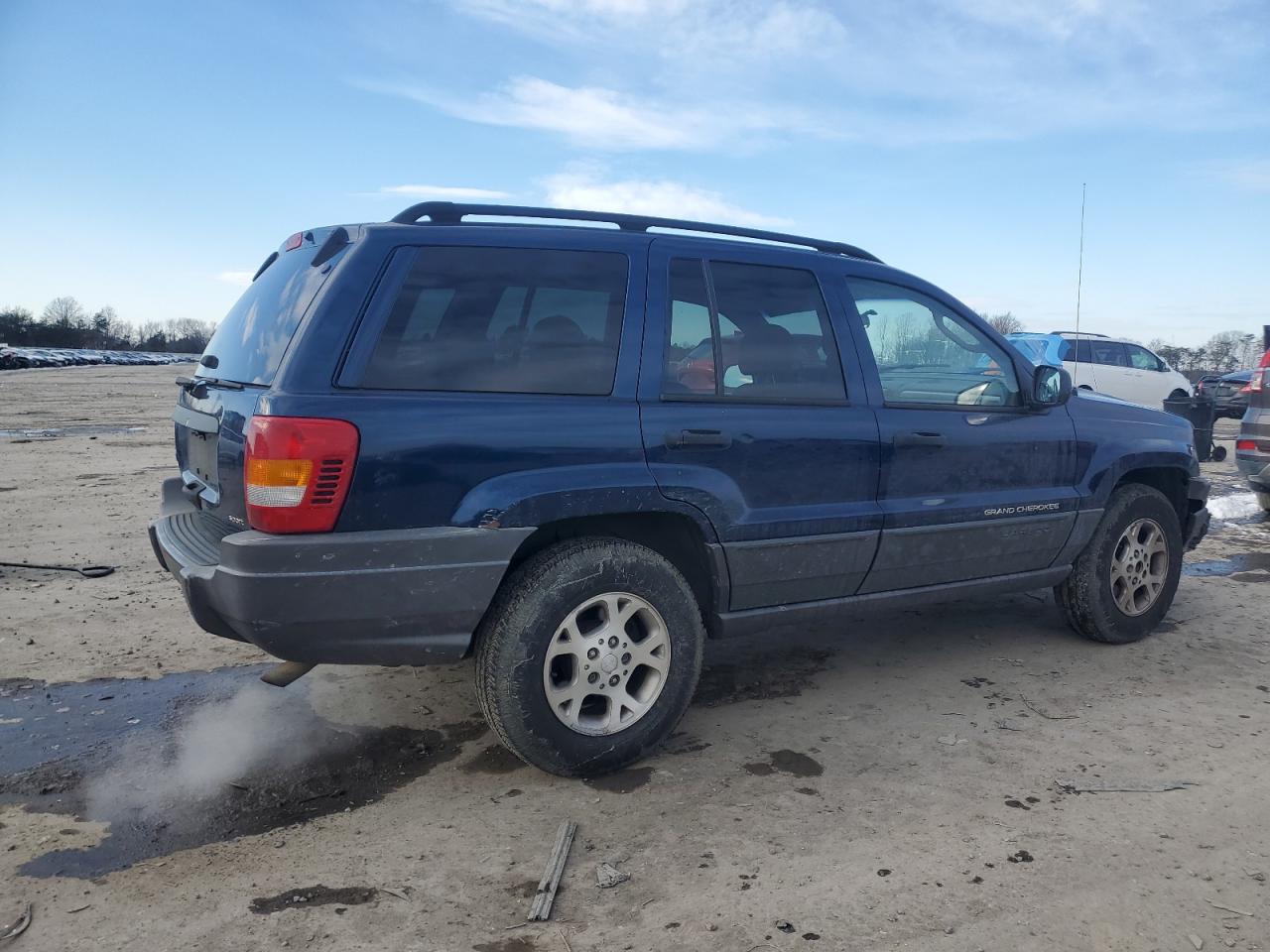 2002 Jeep Grand Cherokee VIN 1J4GW38SX2C165179 Copart auction photo, front end / minor dent/scratches damage thumbnail 3