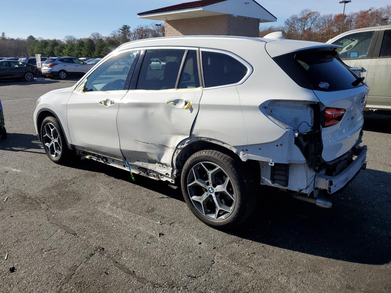 2016 BMW X1 VIN WBXHT3C32G5E52052 Copart auction photo, rear end / side damage thumbnail 2