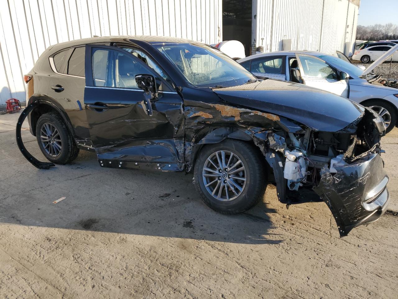 2020 Mazda CX-5 VIN JM3KFBCM3L0805178 Copart auction photo, front end / side damage thumbnail 4