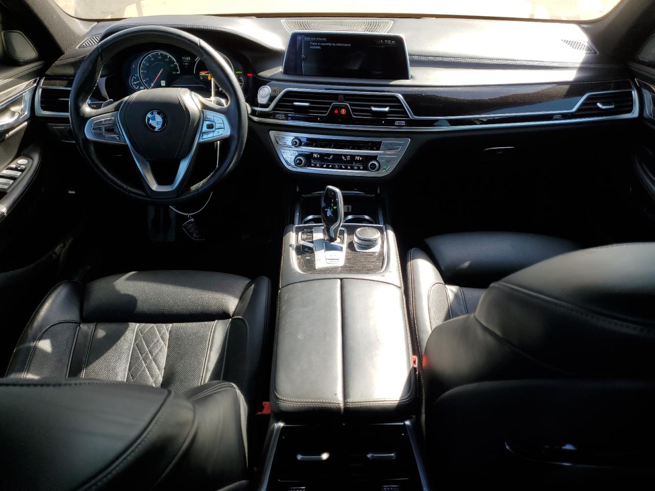 2016 BMW 7er VIN WBA7F2C58GG416375 Copart auction photo, front end / minor dent/scratches damage thumbnail 8