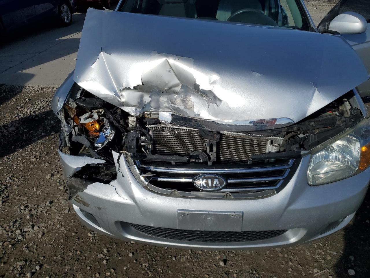 2009 KIA Spectra VIN KNAFE221X95661478 Copart auction photo, front end damage thumbnail 12